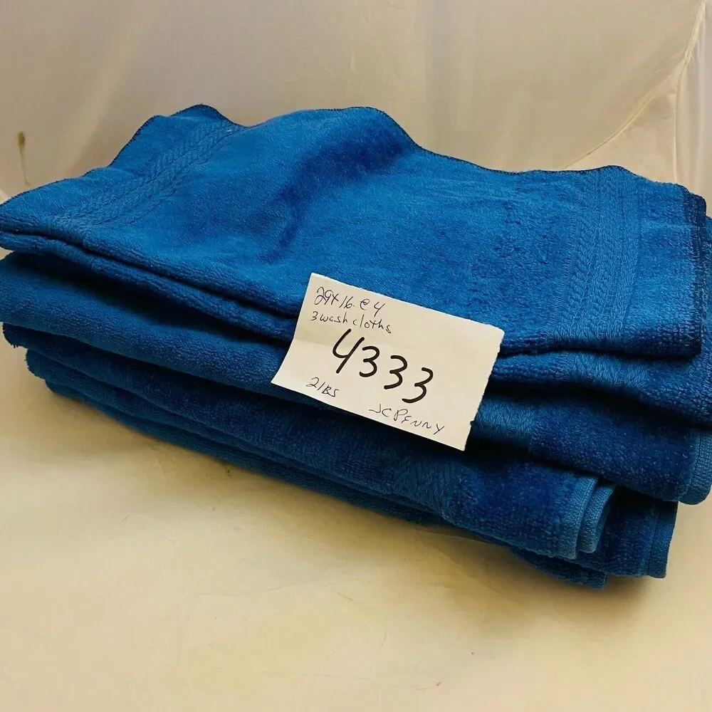 4333 JC Penny blue hand and washcloth towels